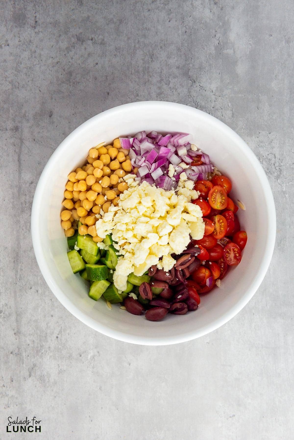 Mediterranean Orzo Salad Recipe 8 - You're going to love this Mediterranean Orzo Salad, a delightful blend of orzo pasta, cherry tomatoes, Persian cucumbers, and kalamata olives