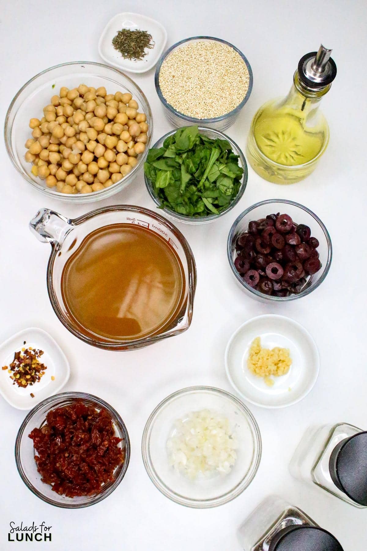 Mediterranean Quinoa Salad Recipe 1 - This Mediterranean Quinoa Bowl with Chickpeas is a tasty and healthy salad that is hearty enough to have as a meal. Enjoy every bite of this fun, flavorful dish at your next lunch break!