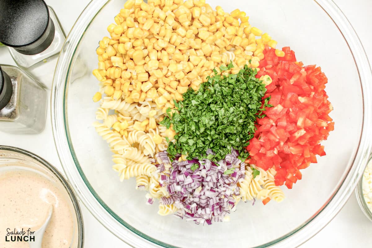 Mexican Street Corn Pasta Salad Recipe 5 - This Mexican Street Corn Pasta Salad is the perfect summer side dish—fresh, flavorful, and so easy to make. Whether you’re hosting a BBQ or just want a quick and delicious meal, this recipe is sure to become a staple in your kitchen. Enjoy every bite of this vibrant, tasty salad!
