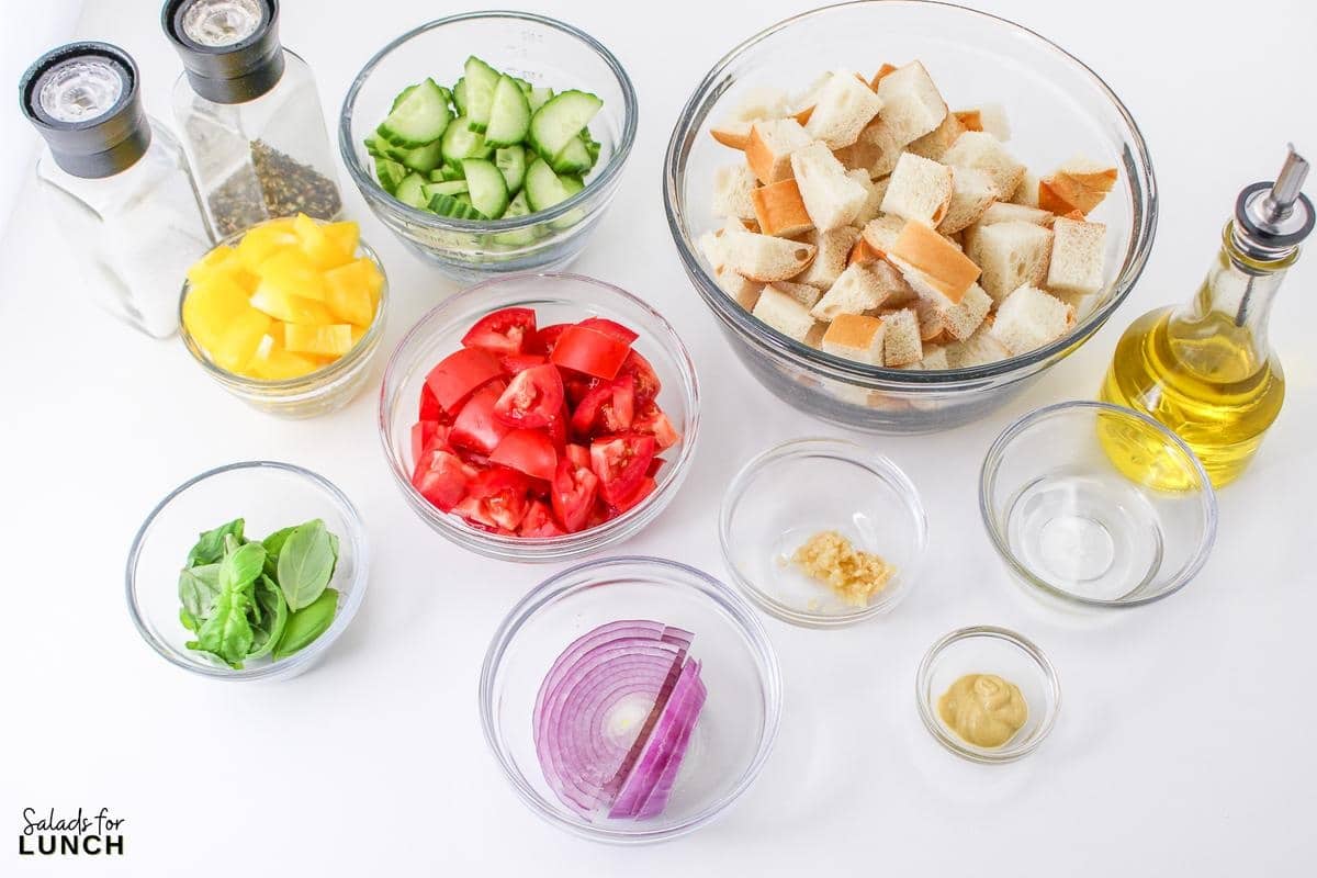 Panzanella Salad 1 - This Classic Italian Panzanella Salad (aka Tuscan Bread Salad) is a refreshing summer salad made with juicy tomatoes, crusty bread, and a simple vinaigrette. This is a great salad to bring to a summer BBQ.