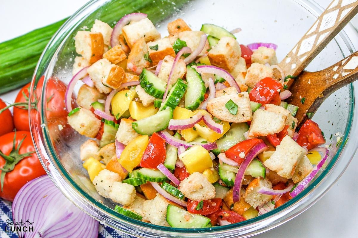Panzanella Salad 12 - This Classic Italian Panzanella Salad (aka Tuscan Bread Salad) is a refreshing summer salad made with juicy tomatoes, crusty bread, and a simple vinaigrette. This is a great salad to bring to a summer BBQ.