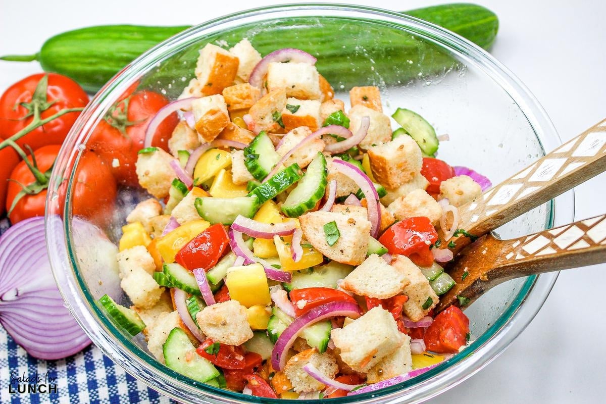 Panzanella Salad 14 - This Classic Italian Panzanella Salad (aka Tuscan Bread Salad) is a refreshing summer salad made with juicy tomatoes, crusty bread, and a simple vinaigrette. This is a great salad to bring to a summer BBQ.