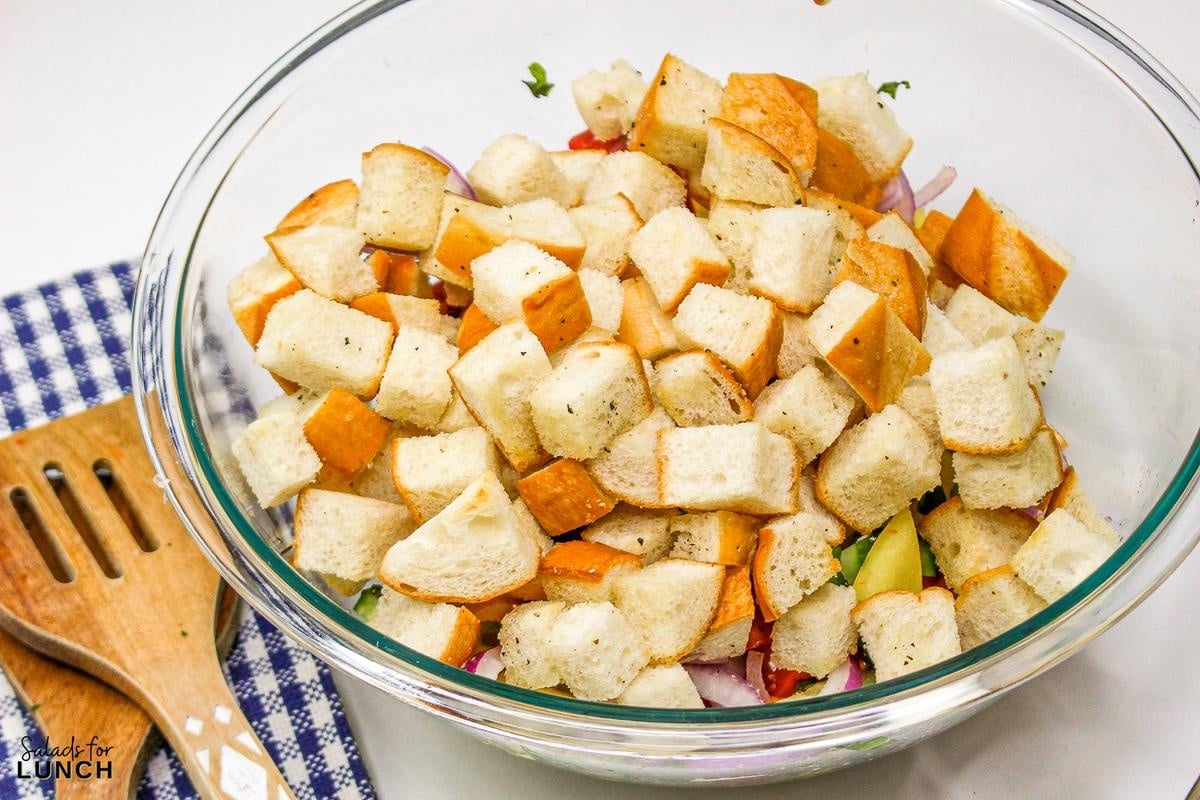 Panzanella Salad 6 - This Classic Italian Panzanella Salad (aka Tuscan Bread Salad) is a refreshing summer salad made with juicy tomatoes, crusty bread, and a simple vinaigrette. This is a great salad to bring to a summer BBQ.