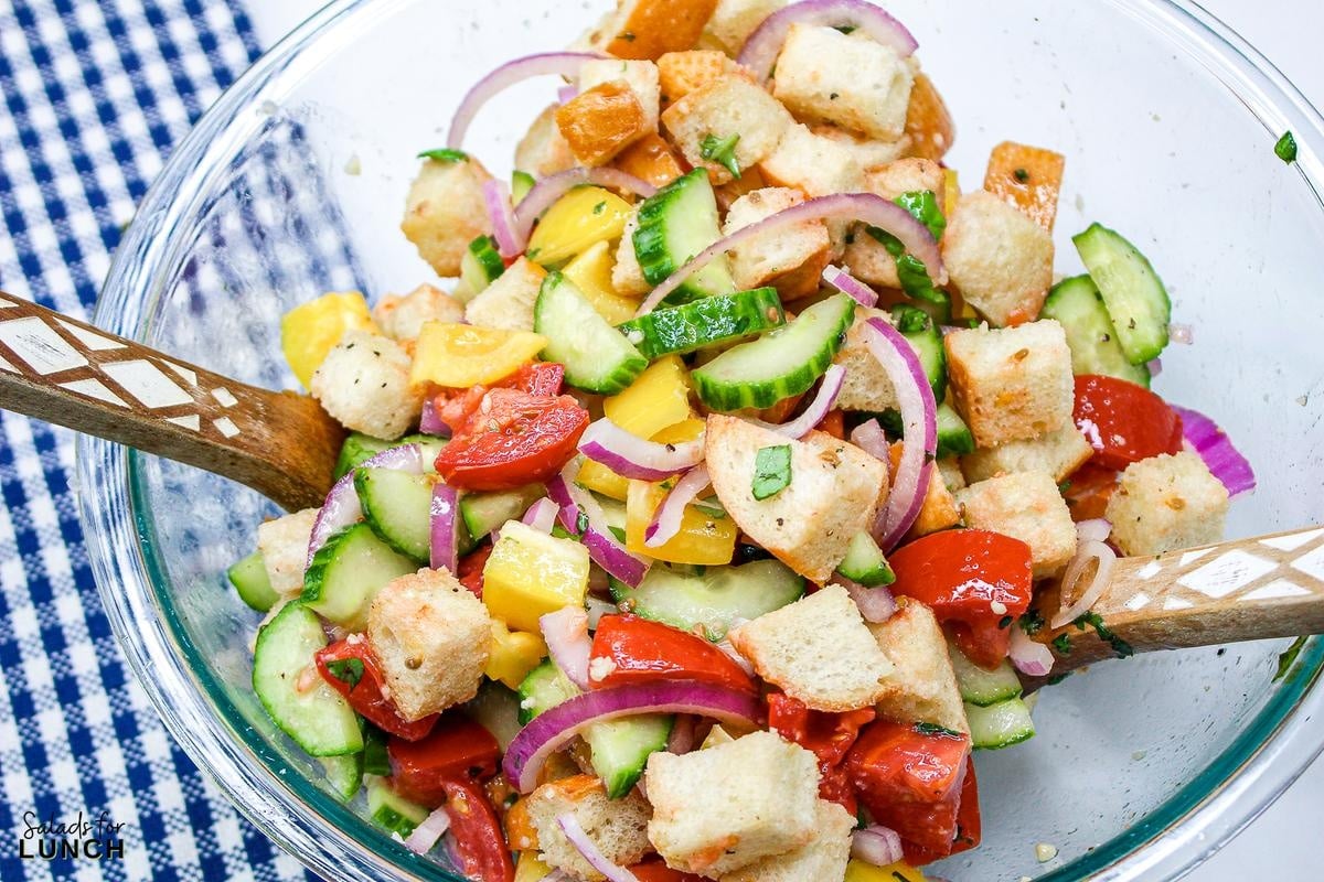 Panzanella Salad 7 - This Classic Italian Panzanella Salad (aka Tuscan Bread Salad) is a refreshing summer salad made with juicy tomatoes, crusty bread, and a simple vinaigrette. This is a great salad to bring to a summer BBQ.