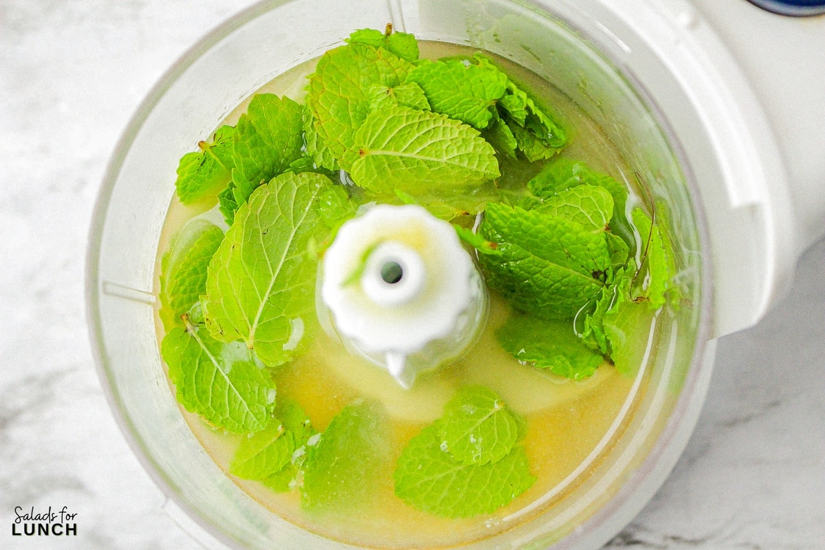 Mint dressing ingredients in a food processor