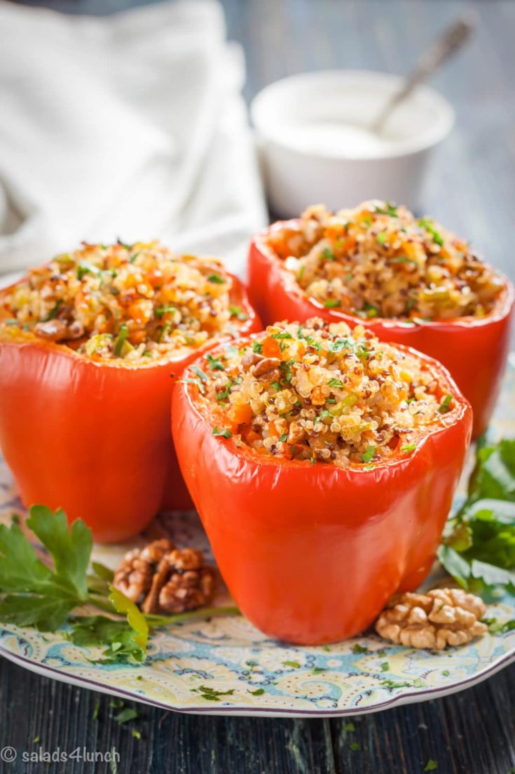 Quinoa Stuffed Peppers 2 - Let’s go keen-wah crazy with this tasty round-up of easy quinoa salad recipes to take to your next potluck! These delicious quinoa salad recipes are gloriously gluten-free with lots of vegetarian options too.