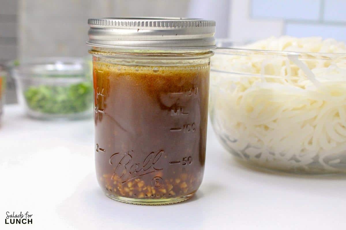 Rice Noodle Salad Recipe 6 - This refreshing salad features tender rice noodles tossed with crisp vegetables and a tangy sesame-lime dressing. It's perfect as a light main course or a flavorful side dish.