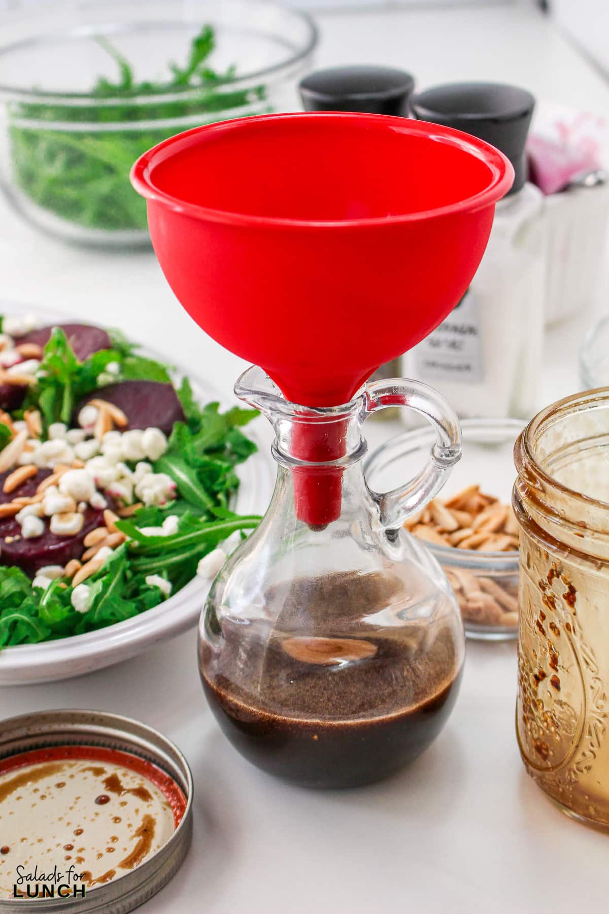 Roasted Beet Salad Recipe 13 1 - With the festive hues of red beets, green arugula, and golden slivered almonds, this Christmas salad recipe is a celebration of flavors and a feast for the eyes that will make your holiday spread merry and bright!