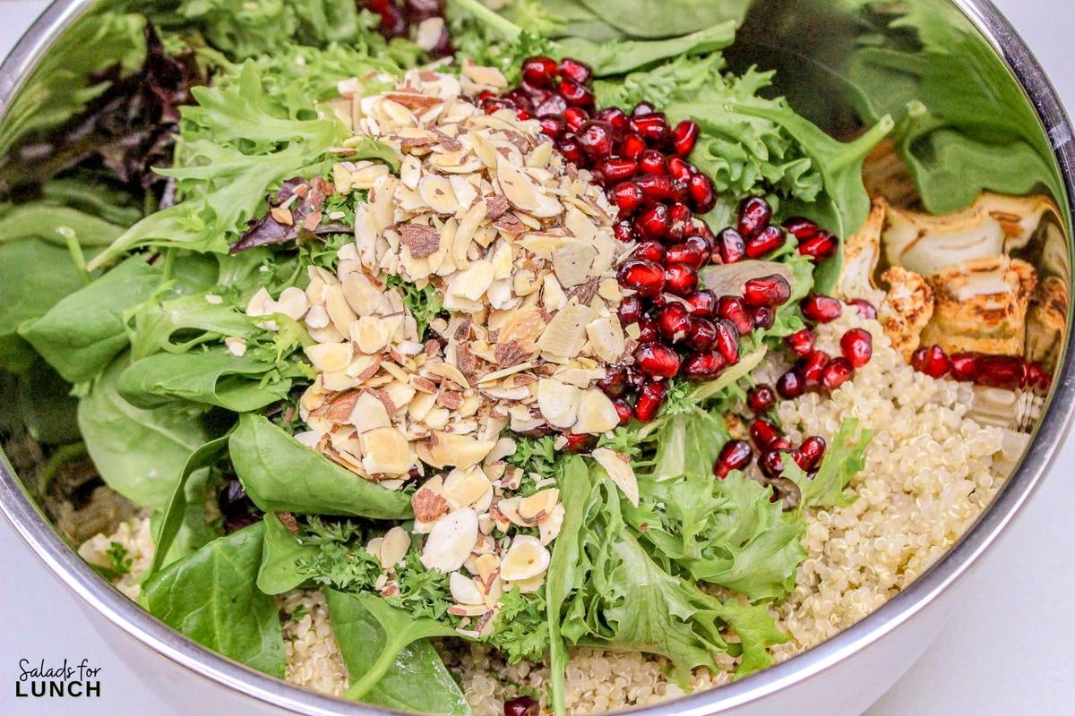 Roasted Cauliflower Salad Recipe 11 - This Roasted Cauliflower Salad with Lemon-Tahini Dressing is everything—golden roasted cauliflower, fresh greens, crunchy almonds, and a tangy, creamy dressing that ties it all together. Bonus: this salad is gluten-free, packed with veggies, and perfect for meal prep or your next dinner party.