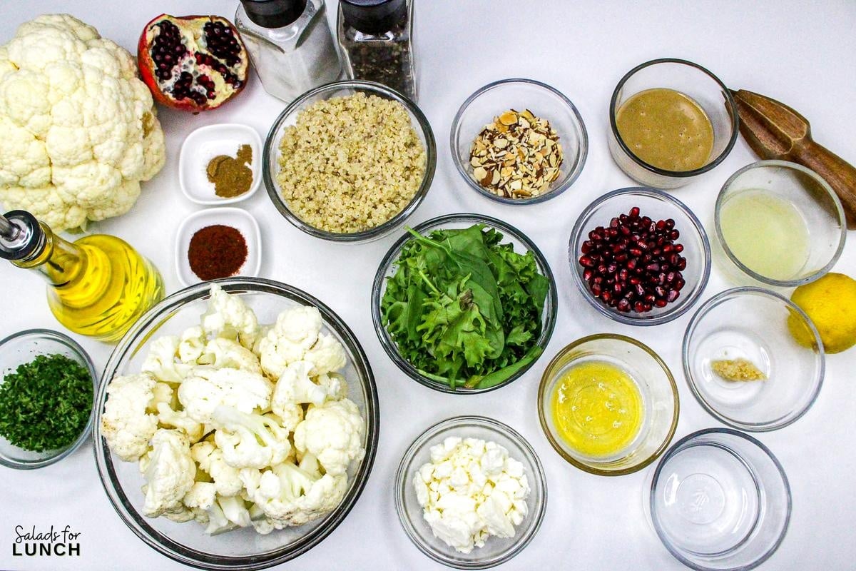 Roasted Cauliflower Salad Recipe 2 - This Roasted Cauliflower Salad with Lemon-Tahini Dressing is everything—golden roasted cauliflower, fresh greens, crunchy almonds, and a tangy, creamy dressing that ties it all together. Bonus: this salad is gluten-free, packed with veggies, and perfect for meal prep or your next dinner party.