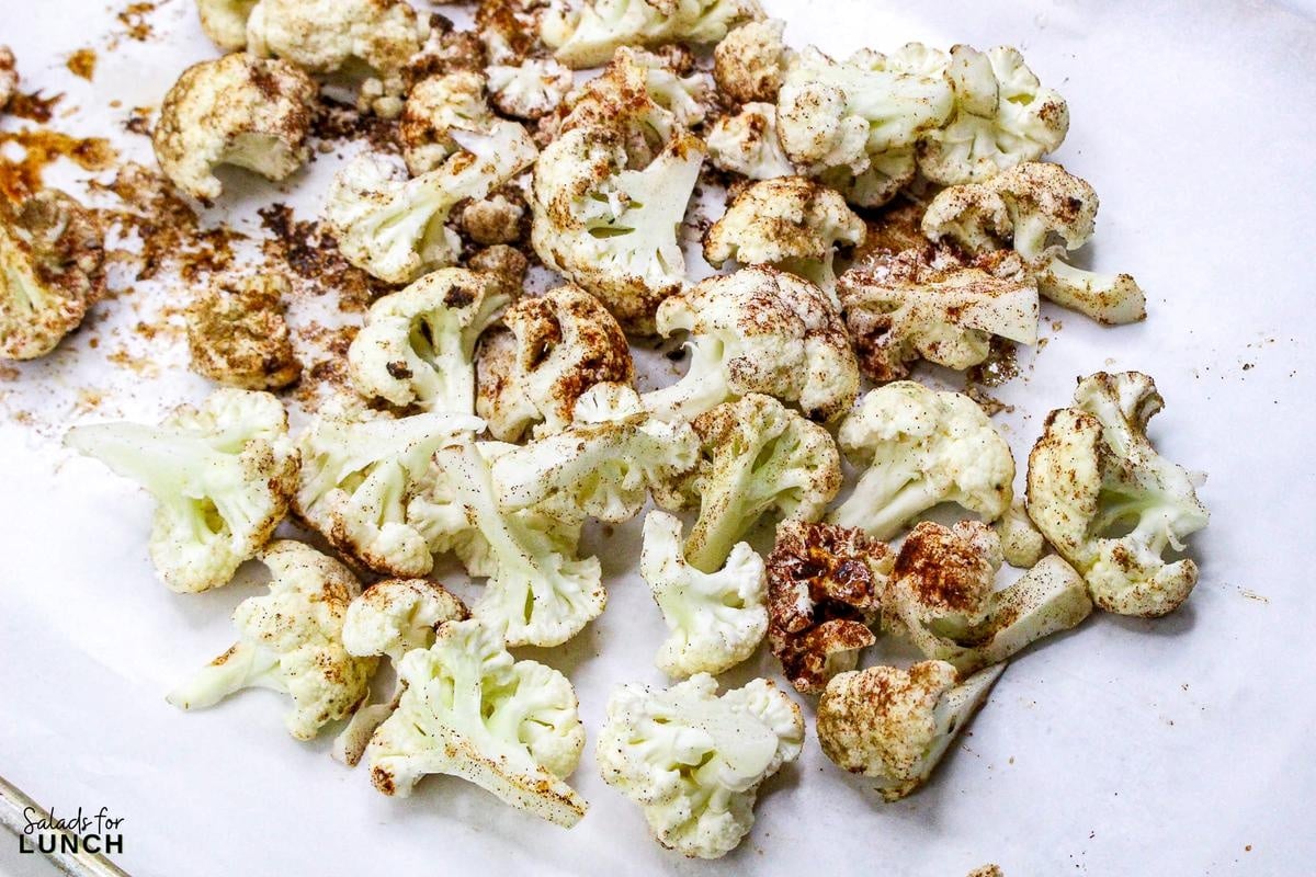 Roasted Cauliflower Salad Recipe 3 - This Roasted Cauliflower Salad with Lemon-Tahini Dressing is everything—golden roasted cauliflower, fresh greens, crunchy almonds, and a tangy, creamy dressing that ties it all together. Bonus: this salad is gluten-free, packed with veggies, and perfect for meal prep or your next dinner party.