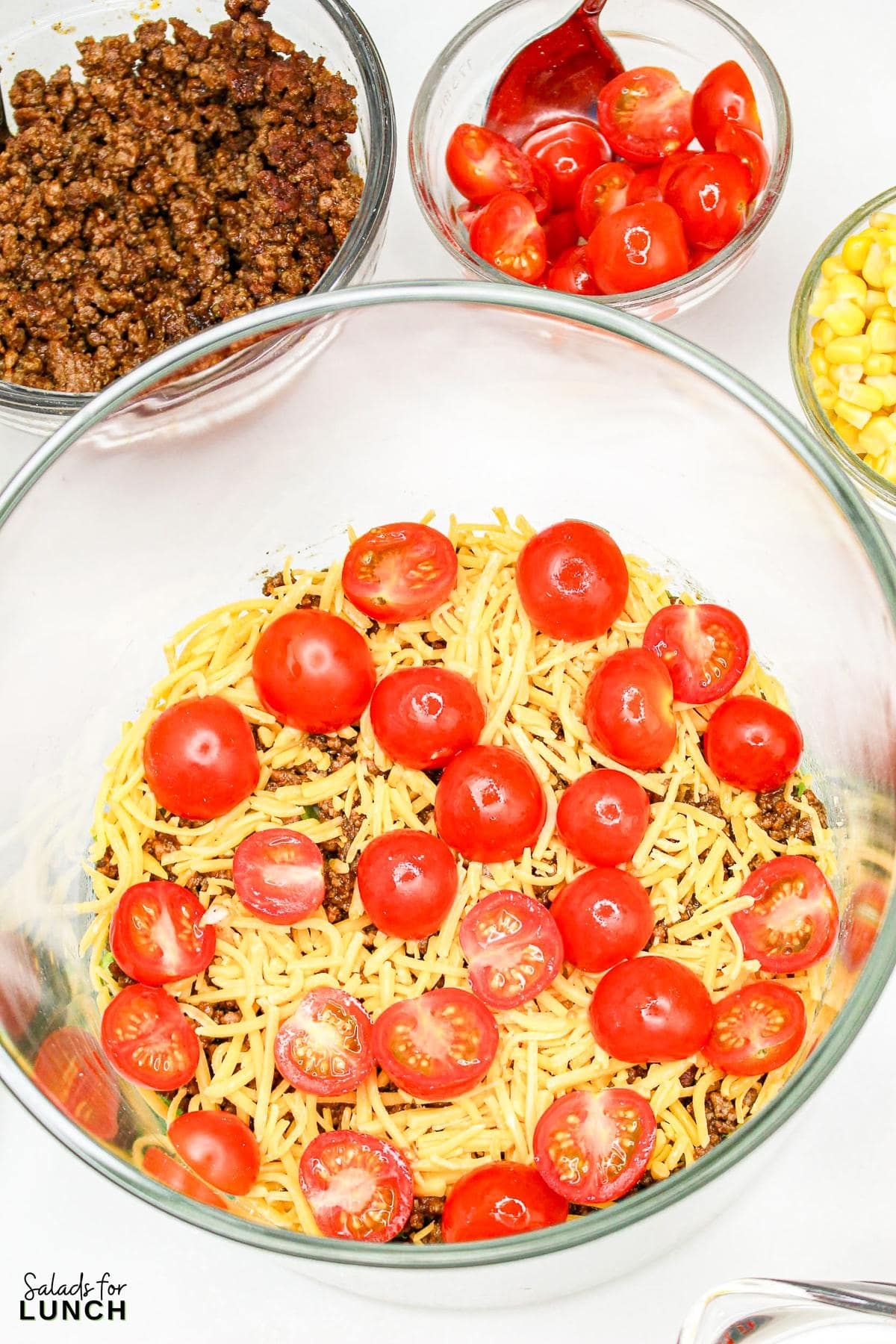 Seven Layer Taco Salad Recipe 3 - Imagine serving up a salad that has all the zest and heartiness of your favorite tacos but with the added benefit of a stunning presentation. This Seven Layer Taco Salad recipe is as easy to assemble as it is delicious, making it a go-to for busy weeknights and festive gatherings alike.