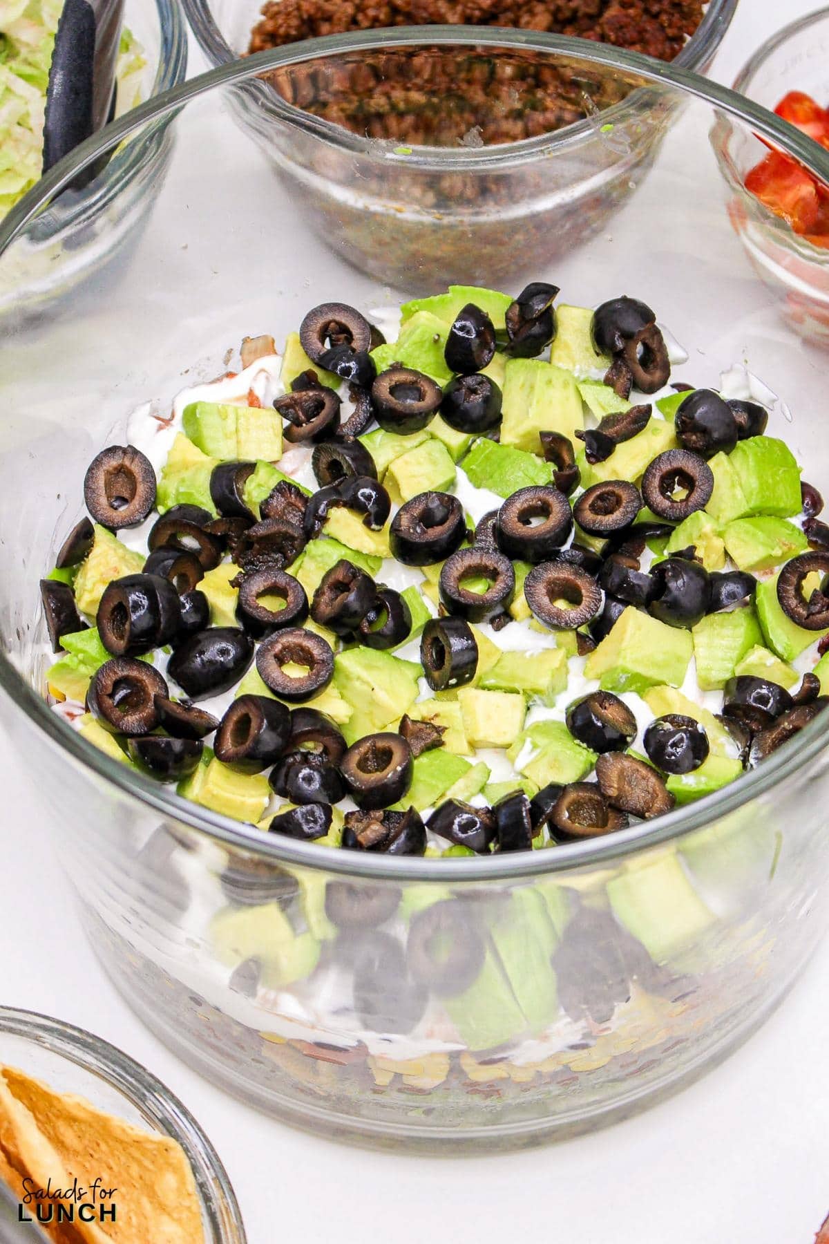 Seven Layer Taco Salad Recipe 5 - Imagine serving up a salad that has all the zest and heartiness of your favorite tacos but with the added benefit of a stunning presentation. This Seven Layer Taco Salad recipe is as easy to assemble as it is delicious, making it a go-to for busy weeknights and festive gatherings alike.