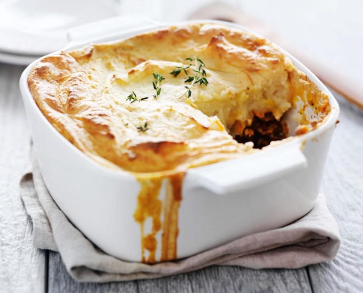 A simple version of the classic meat and vegetable comfort food casserole topped with cheesy garlic mashed potatoes, this is the best Shepherds Pie recipe you'll ever make! #easyshepherdspie #casserole #gluten-free #groundbeef