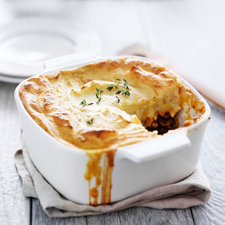 A simple version of the classic meat and vegetable comfort food casserole topped with cheesy garlic mashed potatoes, this is the best Shepherd's Pie recipe you'll ever make! #easyshepherdspie #casserole #gluten-free #groundbeef
