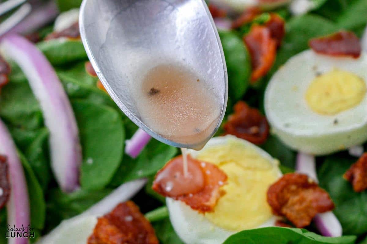 Spinach Salad with Eggs and Bacon Recipe 18 - Spring is officially in full bloom, and that means it’s time to celebrate all the amazing spring salad ingredients May has to offer! 🌷💚 From sweet strawberries to crisp asparagus, the produce aisle is bursting with color—and flavor. And what better way to use all that seasonal goodness than in a delicious salad?