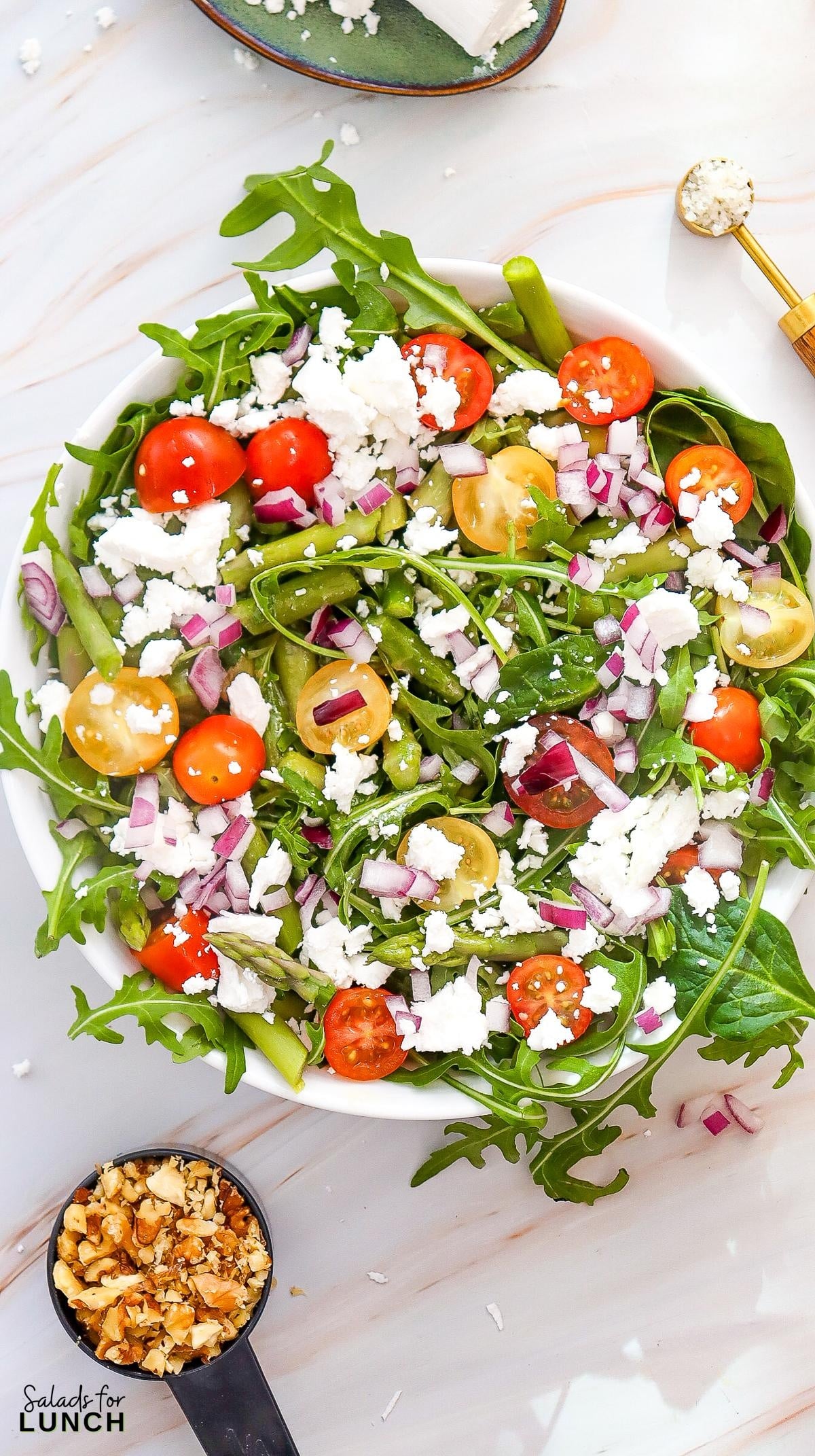 Spring Asparagus and Goat Cheese Salad Recipe 10 - Spring is officially in full bloom, and that means it’s time to celebrate all the amazing spring salad ingredients May has to offer! 🌷💚 From sweet strawberries to crisp asparagus, the produce aisle is bursting with color—and flavor. And what better way to use all that seasonal goodness than in a delicious salad?