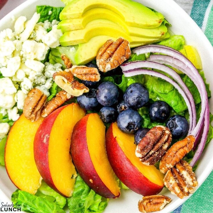 Summer Peach Salad Square Featured Photo 1 - Shake up your weekday lunch with these tasty, healthy salads for lunch recipes that are great on the go. Make a filling and healthy salad that will power you through any work day. Full of protein and fiber these quick salads are an easy way to spruce up your lunch.