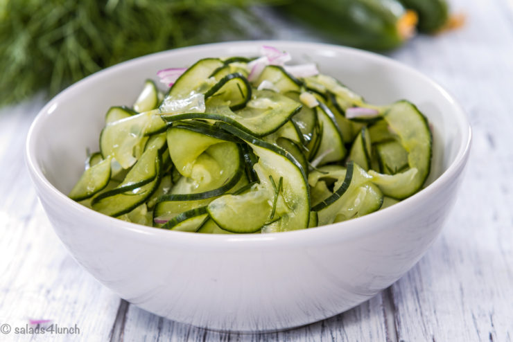 White bowl spiralized cucmber salad