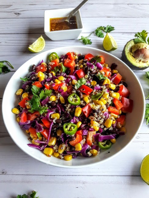 Tex Mex Quinoa 4.jpgfit4882c651ssl1 - Let’s go keen-wah crazy with this tasty round-up of easy quinoa salad recipes to take to your next potluck! These delicious quinoa salad recipes are gloriously gluten-free with lots of vegetarian options too.