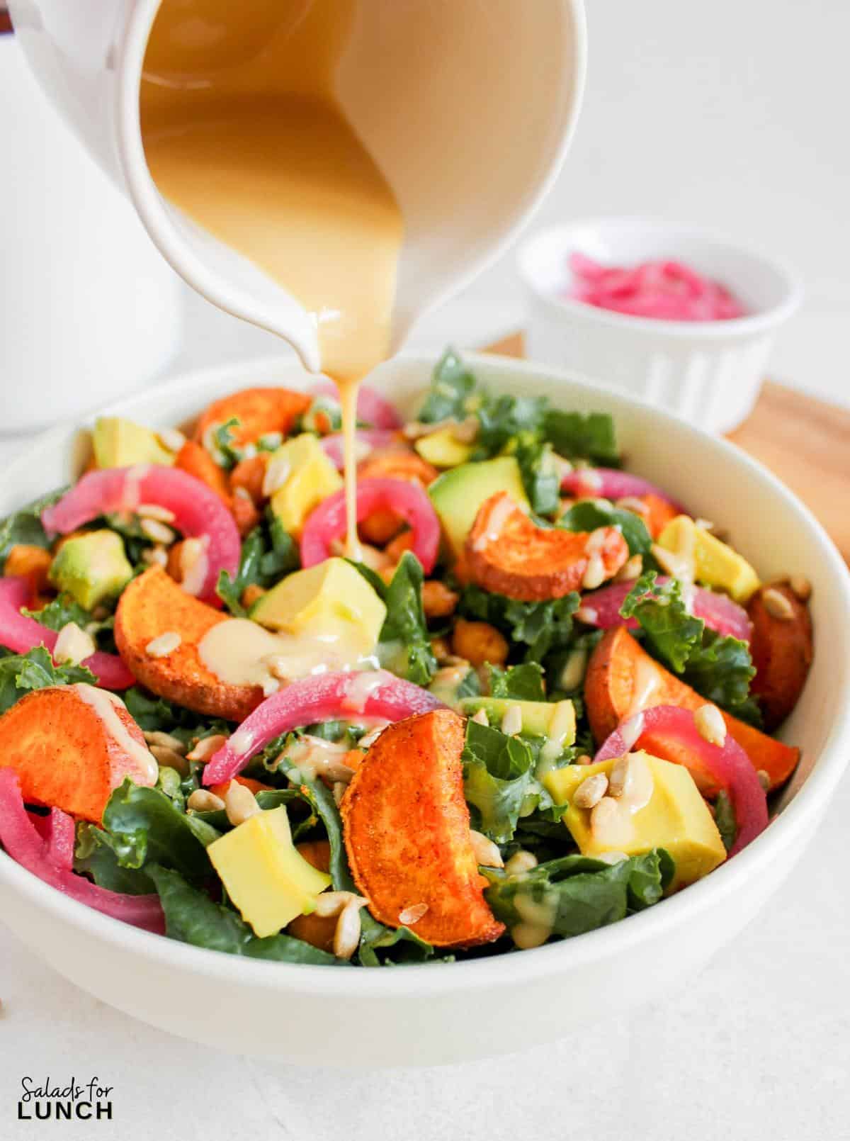 Vegan Fall Harvest Salad with Creamy Tahini Dressing Recipe 11 - This Vegan Fall Salad with Creamy Mustard Tahini Dressing is the perfect cozy dish to welcome the cooler weather. It’s hearty enough to be a meal on its own, yet light enough to leave you feeling energized. Whether you're making it for lunch or dinner, this salad is a delicious and easy way to enjoy the best flavors of fall. So, grab your ingredients and get ready to dig into a bowl of autumn goodness!