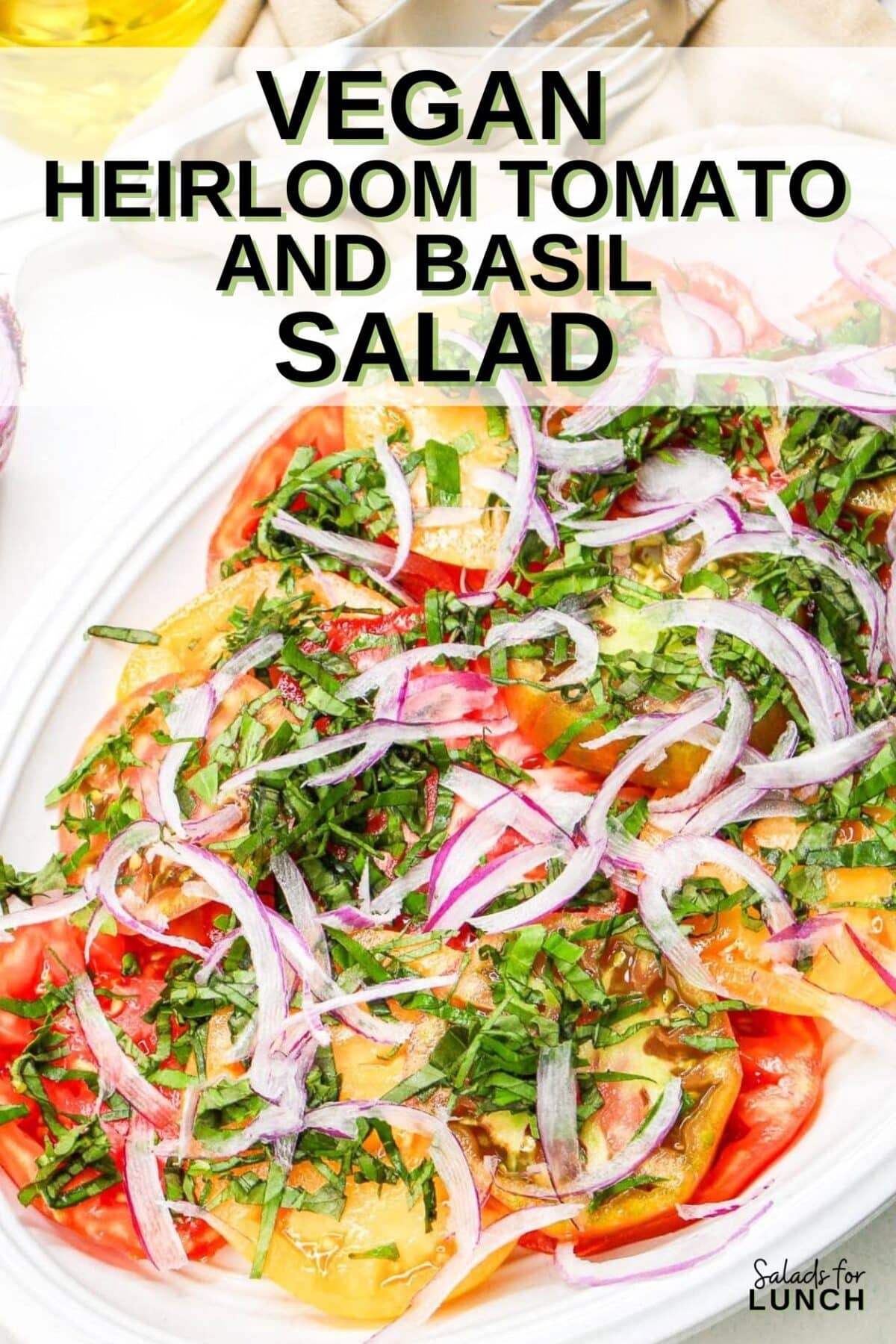 Vegan Heirloom Tomato Salad Recipe - This fresh and vibrant salad showcases the natural sweetness of heirloom tomatoes paired with the aromatic essence of basil. It's a perfect dish for a light lunch or as a side to complement your favorite summer meals.