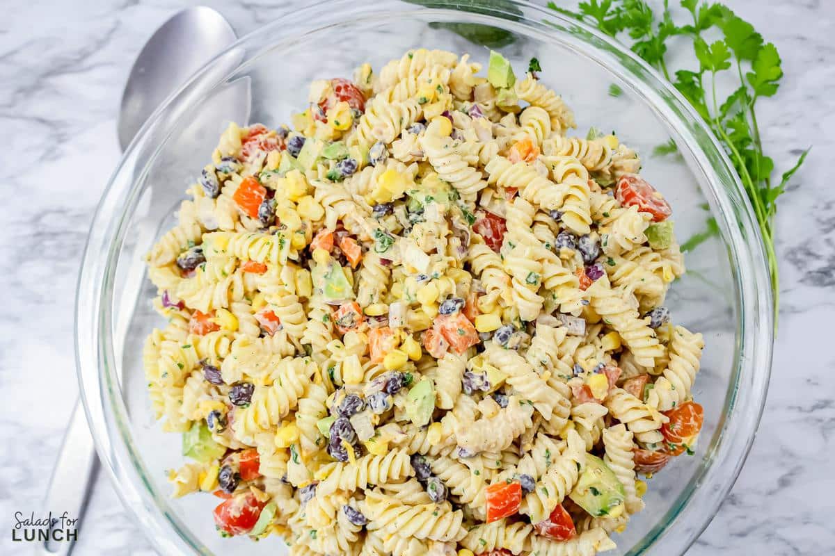 Vegetarian Mexican Pasta Salad 15 - You're going to love this Vegetarian Mexican Pasta Salad! Tender pasta is combined with Mexican-inspired flavors that's loaded with corn, black beans, tomatoes, jalapeño, cilantro, and a creamy lime dressing for a perfect summer time salad, great for barbecues, picnics, grilled meats or fish and more!