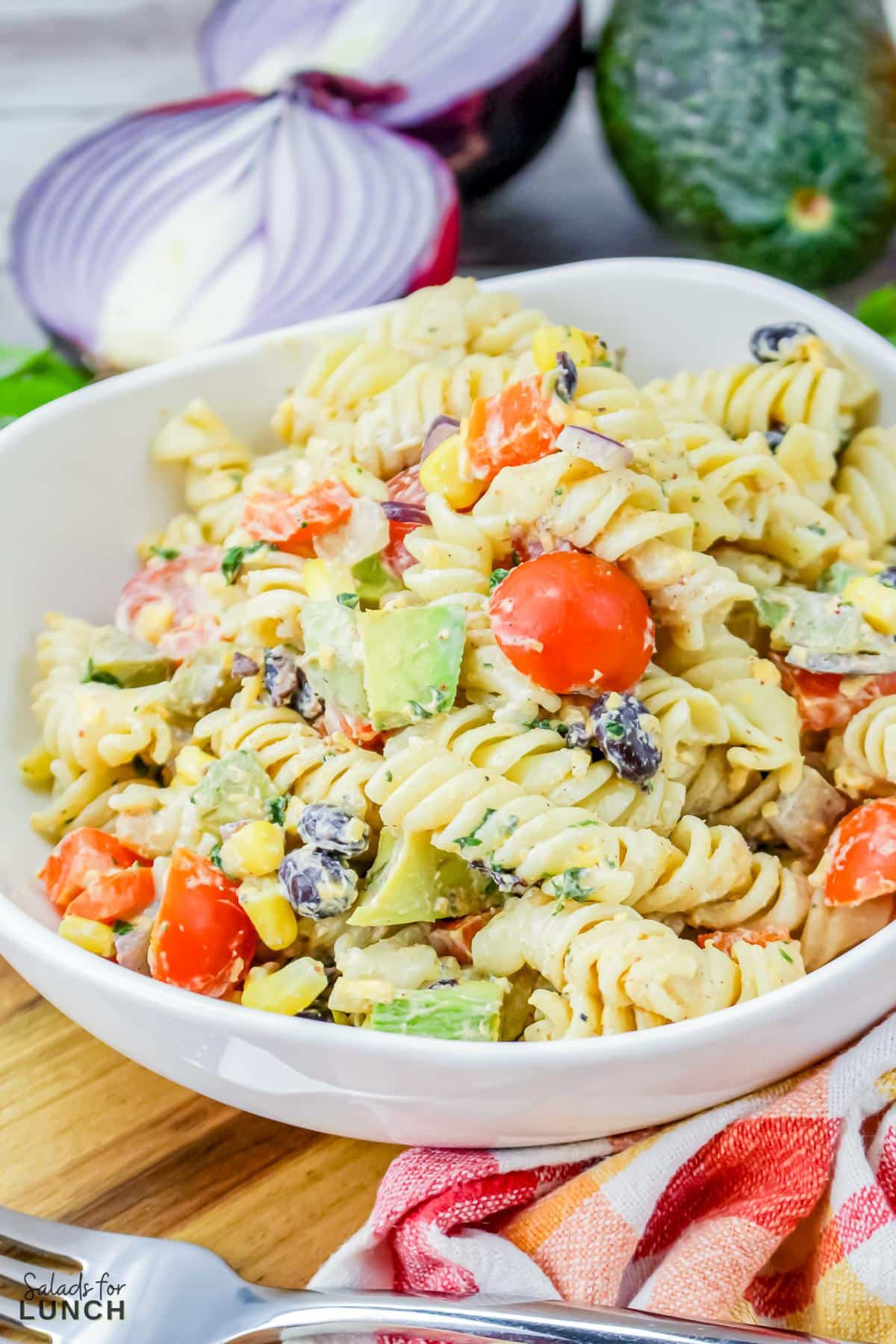 Vegetarian Mexican Pasta Salad 23 - You're going to love this Vegetarian Mexican Pasta Salad! Tender pasta is combined with Mexican-inspired flavors that's loaded with corn, black beans, tomatoes, jalapeño, cilantro, and a creamy lime dressing for a perfect summer time salad, great for barbecues, picnics, grilled meats or fish and more!