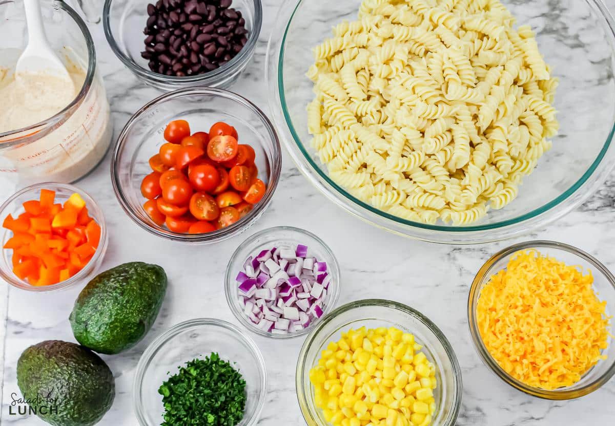 Vegetarian Mexican Pasta Salad 5 - You're going to love this Vegetarian Mexican Pasta Salad! Tender pasta is combined with Mexican-inspired flavors that's loaded with corn, black beans, tomatoes, jalapeño, cilantro, and a creamy lime dressing for a perfect summer time salad, great for barbecues, picnics, grilled meats or fish and more!
