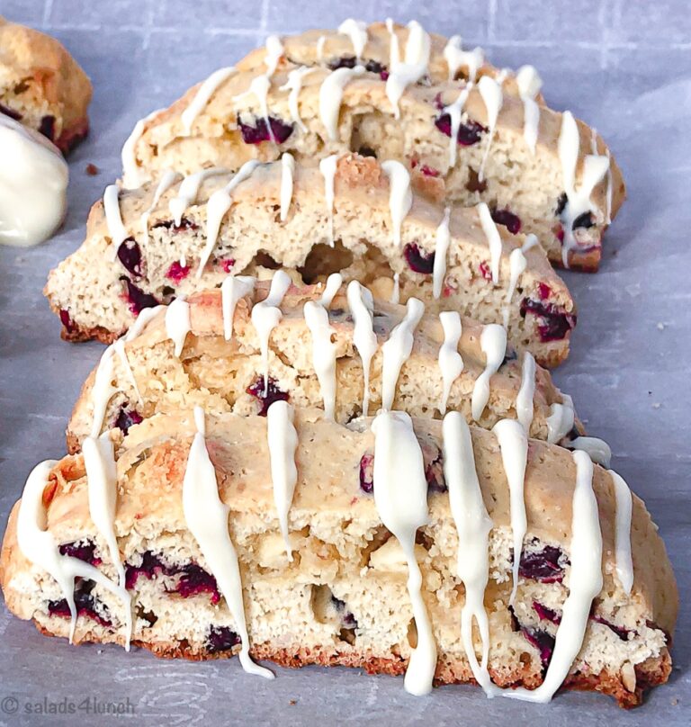Close up of White Chocolate Cranberry Almond Biscotti on a baking sheet