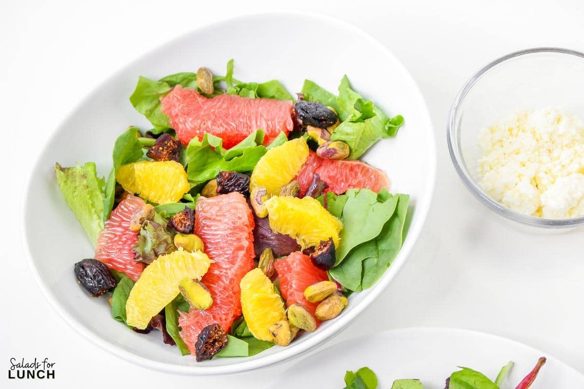 Winter Citrus Salad 16 - This Winter Citrus Salad is the perfect winter salad to go with almost any meal. The tangy citrus vinaigrette, paired with salty feta, sweet figs, roasted pistachios and fresh greens will instantly make you feel like you have your life together. Want more to love? This recipe is grain and gluten-free, and can be made paleo or vegan.