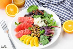 Winter Citrus Salad 17 - This Winter Citrus Salad is the perfect winter salad to go with almost any meal. The tangy citrus vinaigrette, paired with salty feta, sweet figs, roasted pistachios and fresh greens will instantly make you feel like you have your life together. Want more to love? This recipe is grain and gluten-free, and can be made paleo or vegan.