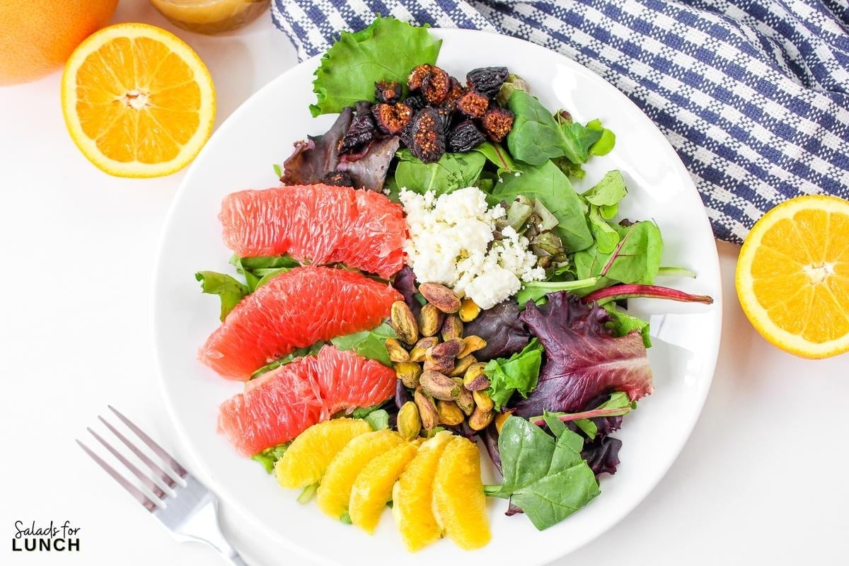 Winter Citrus Salad 20 - This Winter Citrus Salad is the perfect winter salad to go with almost any meal. The tangy citrus vinaigrette, paired with salty feta, sweet figs, roasted pistachios and fresh greens will instantly make you feel like you have your life together. Want more to love? This recipe is grain and gluten-free, and can be made paleo or vegan.