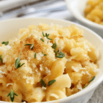 Homemade creamy baked mac and cheese doesn’t have to be complicated with layers of ingredients to be the soul-warming food you crave. This homemade baked macaroni and cheese is my most favorite and has pleased crowds, small families, kids and picky eaters alike–give it a try and you’ll see why. #comfortfood #kidfriendly #casserole #pastarecipe #macandcheese #dinnerinspiration